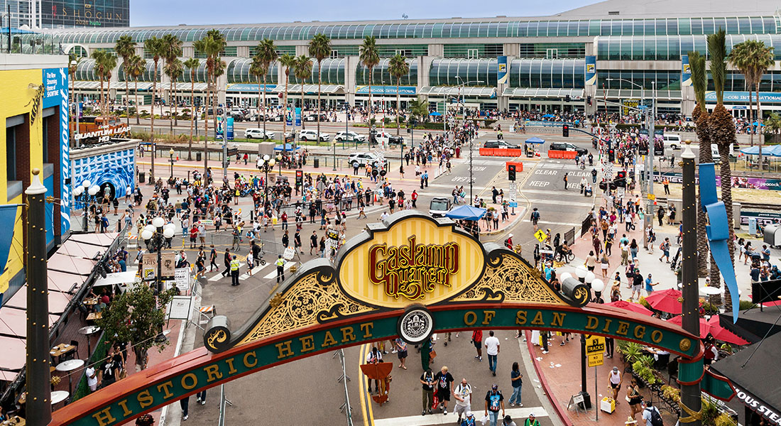 Pedestrians and Comic-Con fans in front of the San Diego Convention Center